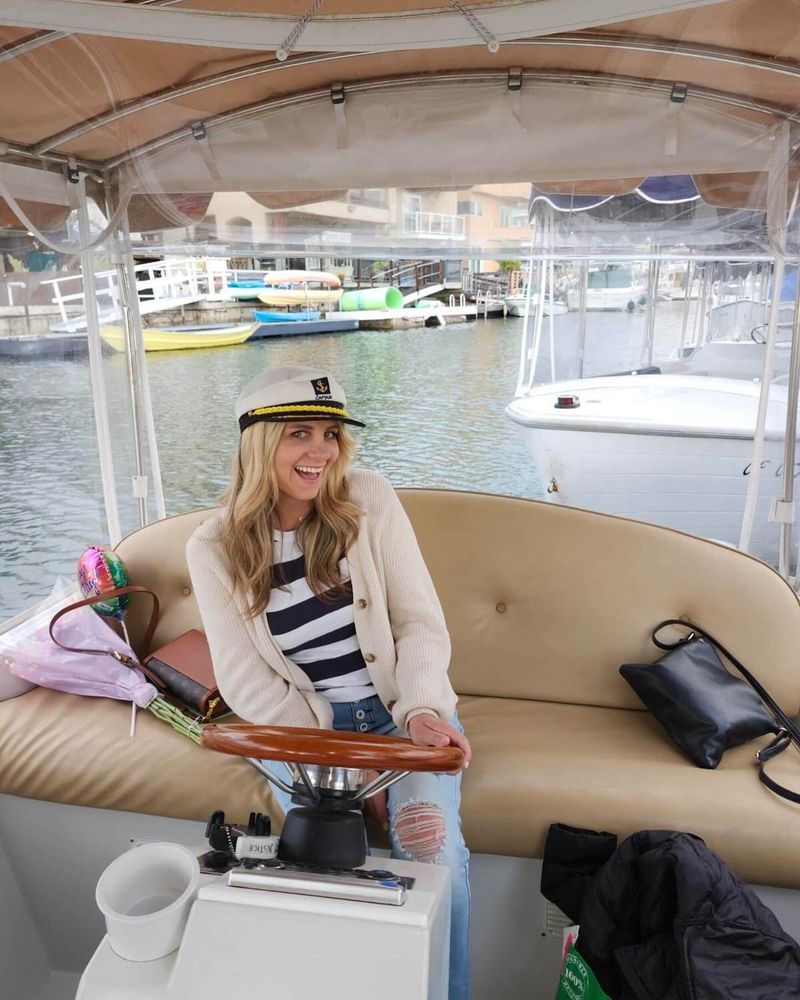 Woman captain at wheel
