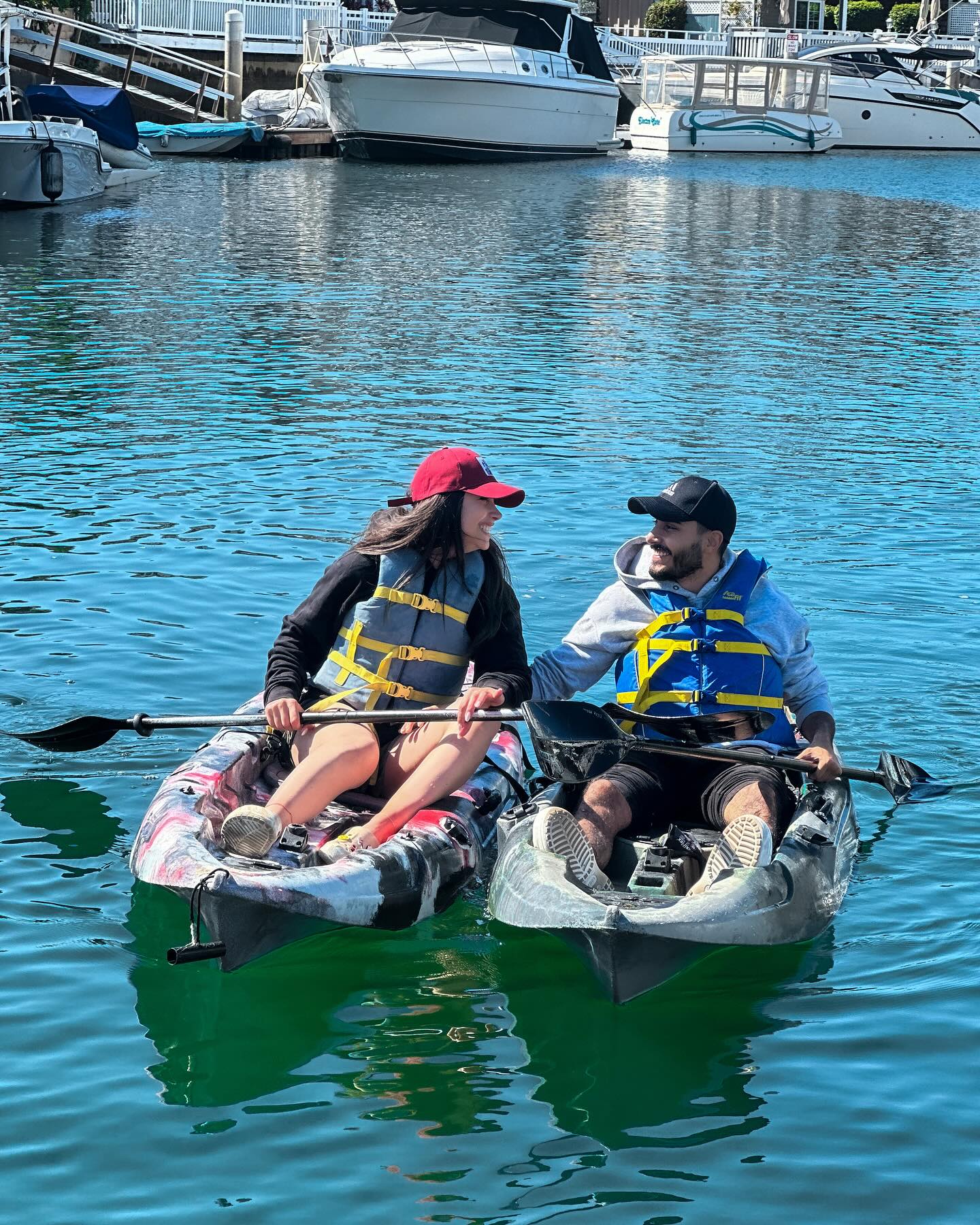 Couple kayaking side by side