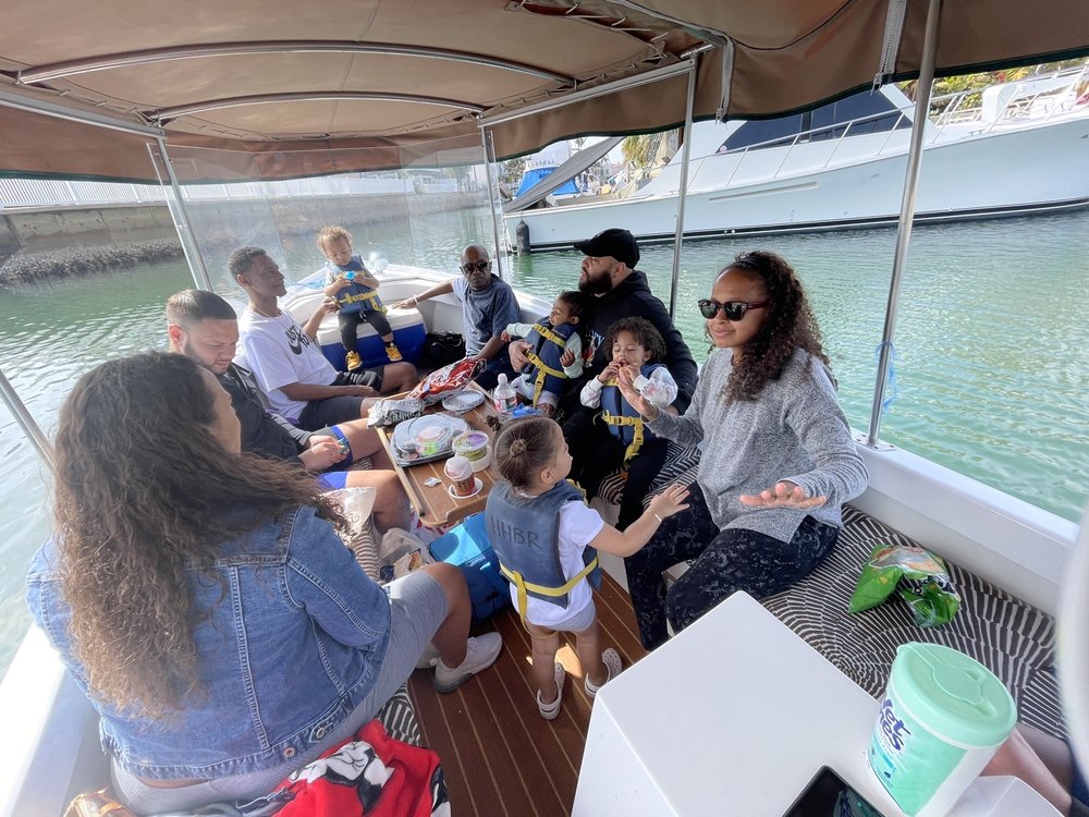 Family on Duffy boat