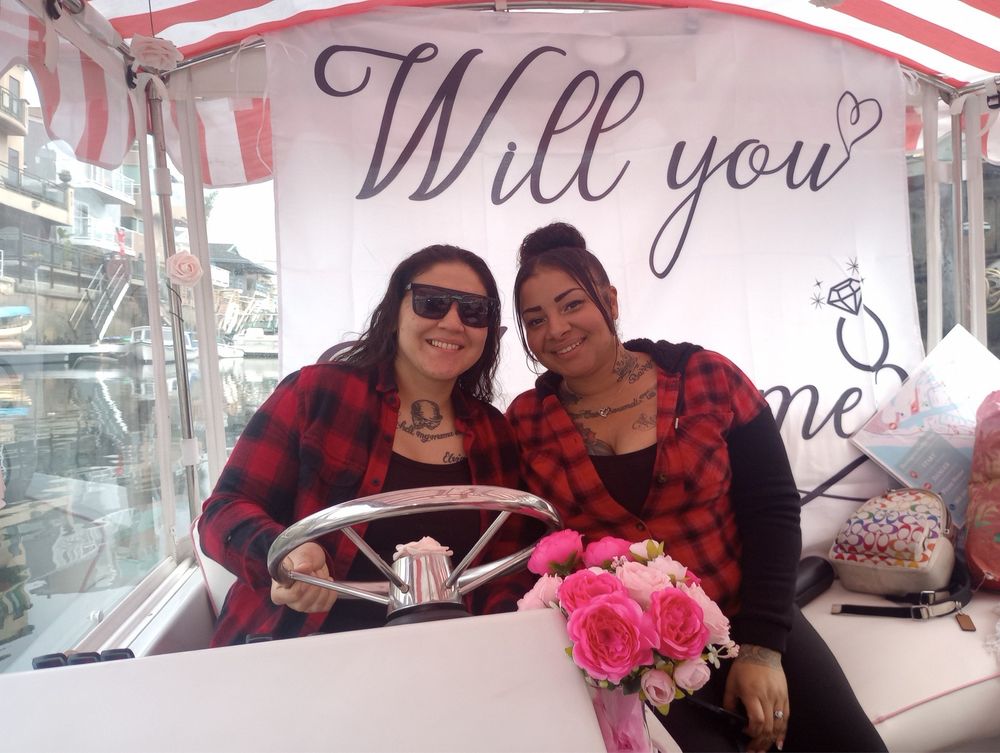 Engaged couple celebrating