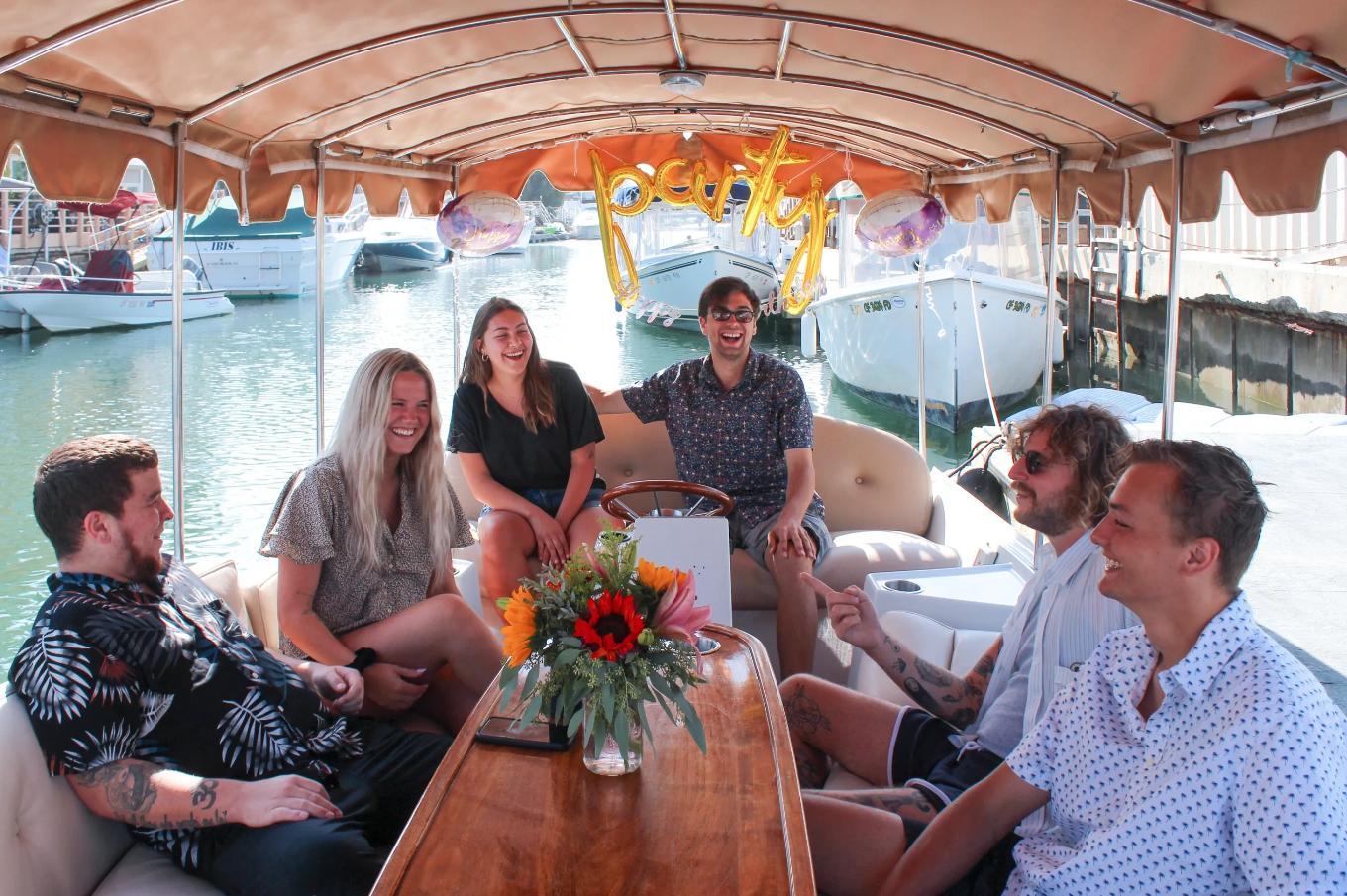 Friends celebrating with Party balloons