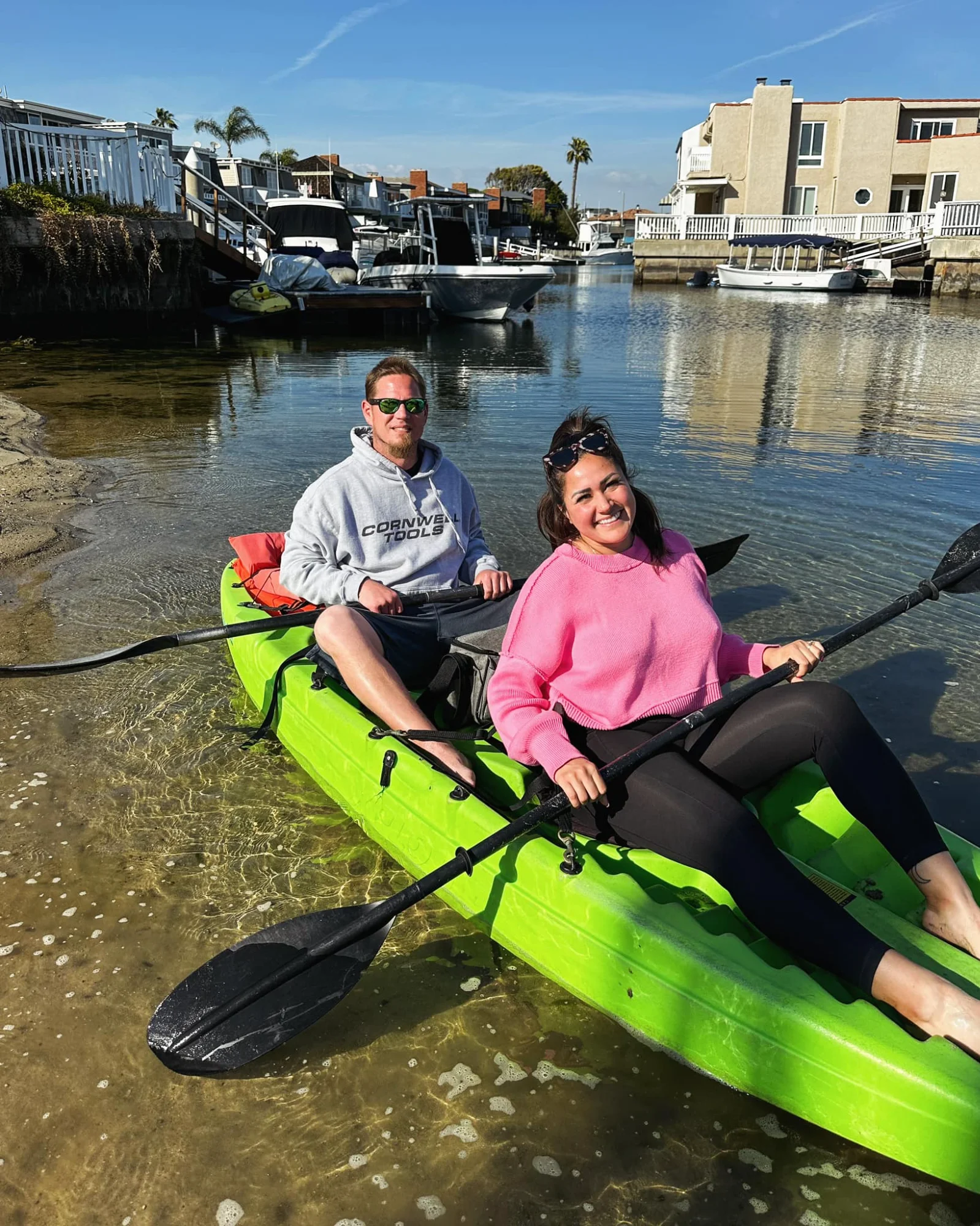 Happy couple in tandem kayak
